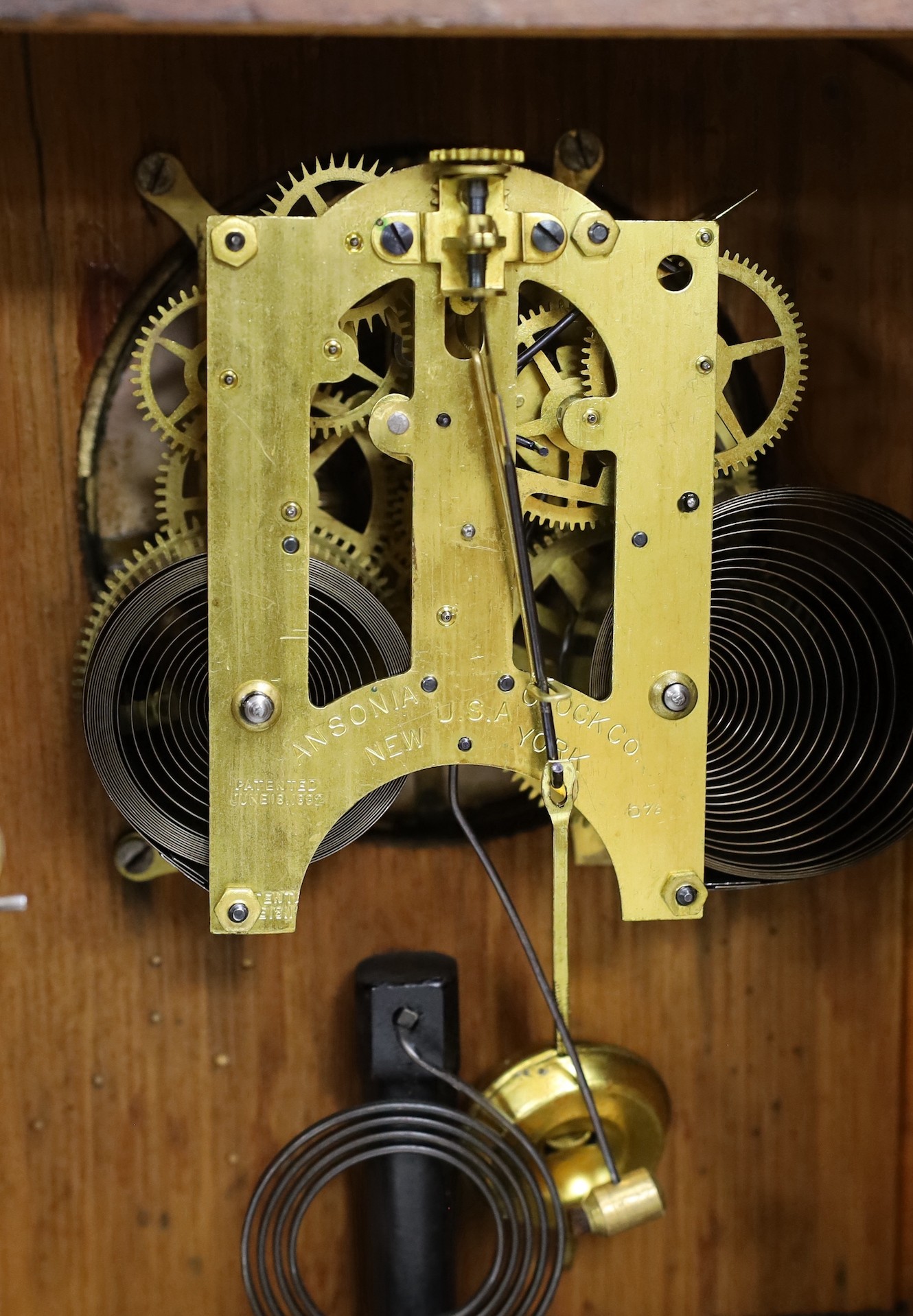 An Edwardian mantel clock and an American clock, tallest 38cms high